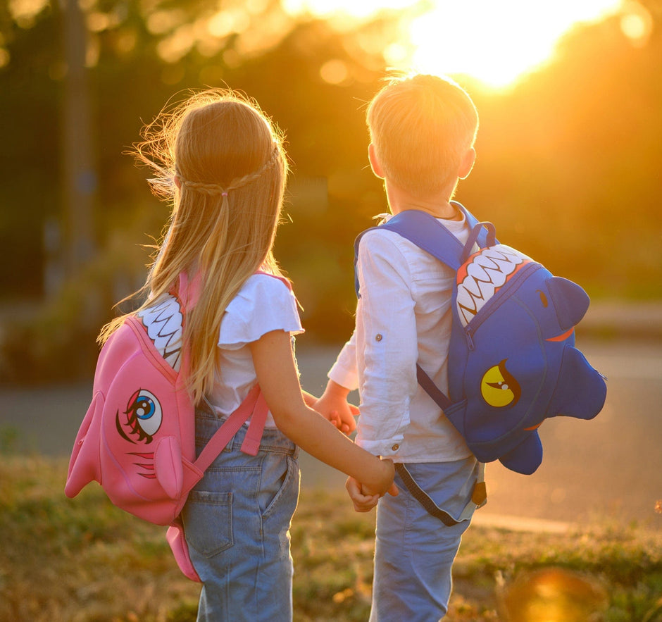2 kids with Crazy Safety backpacks - so happy in the sunlight