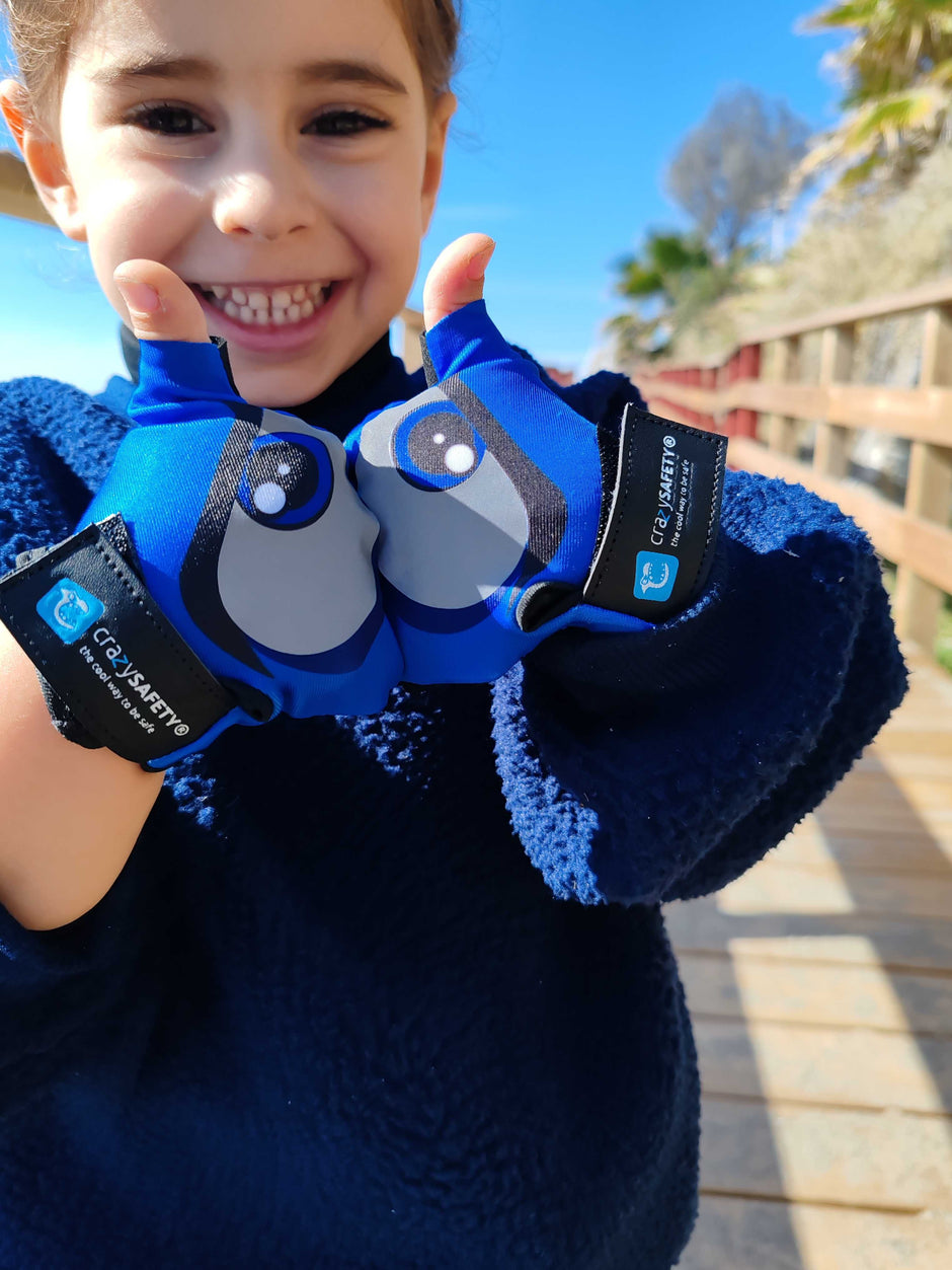 Boy with Crazy Safety gloves with reflective eyes